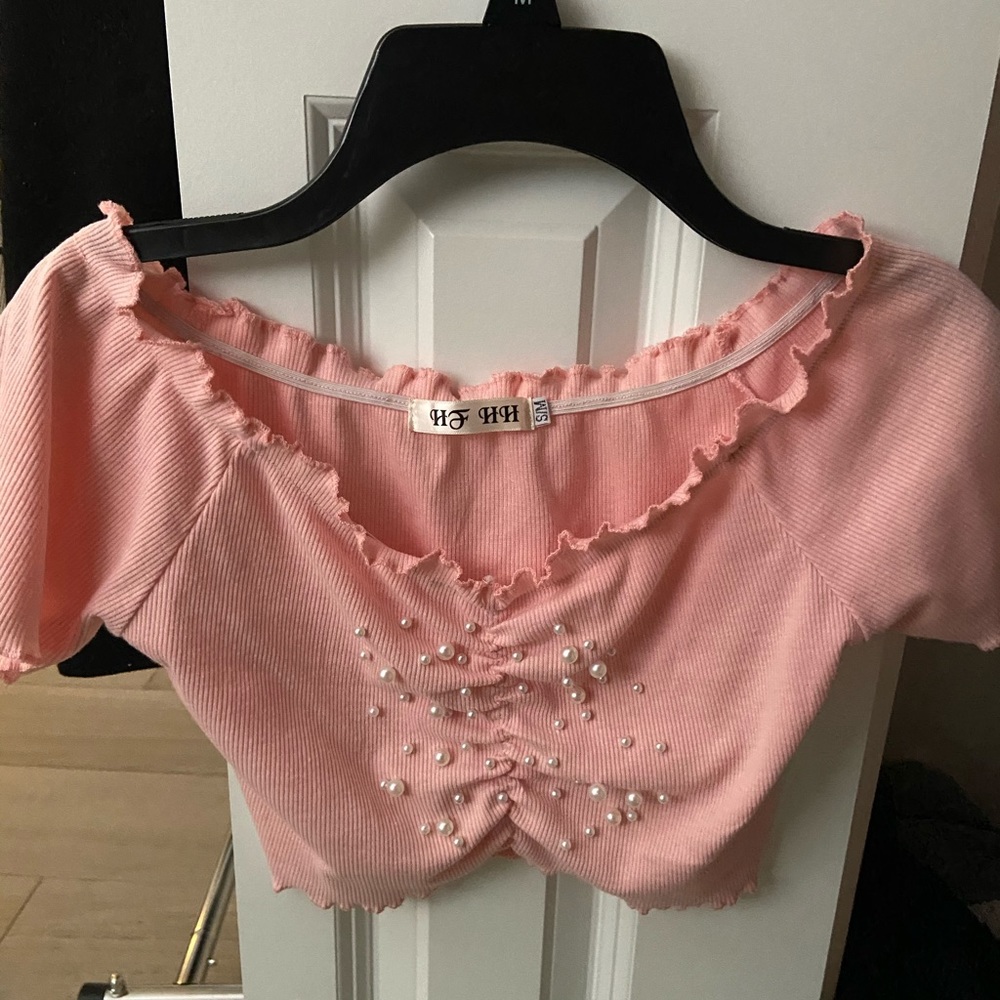 Pink cropped off the shoulder shirt